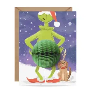 Carte de voeux popup du Grinch avec un pompon vert à la place du ventre.