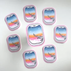 Sticker Coucher de Soleil par le Hublot